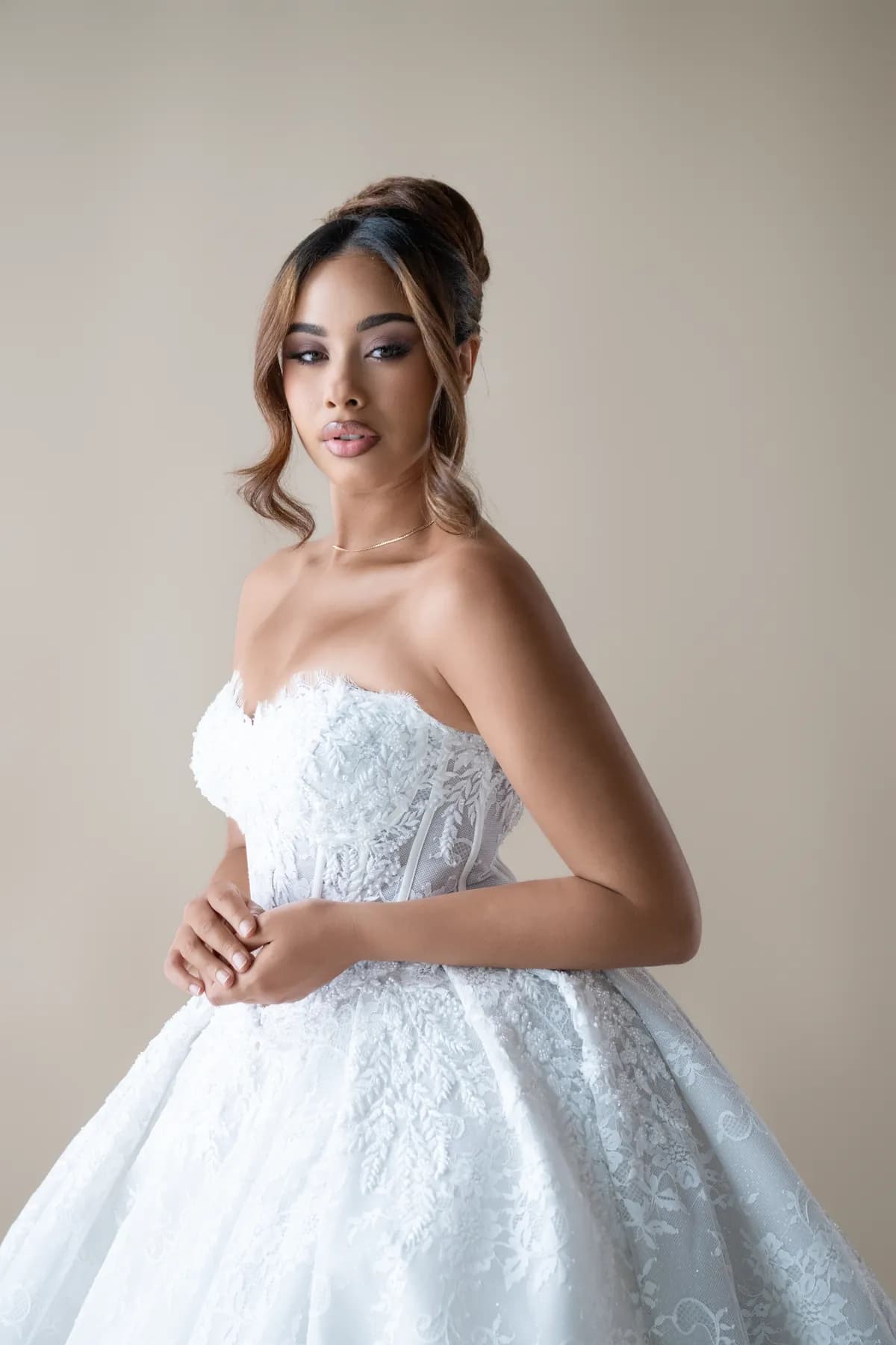 Robe de mariée du showroom Umel Couture disponible à la location
